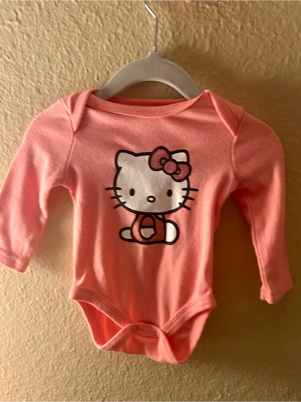 Hello Kitty Coral Pink Long-Sleeve Baby Bodysuit